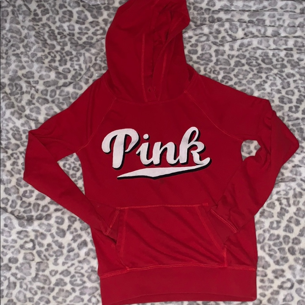 Red hoodie from pink